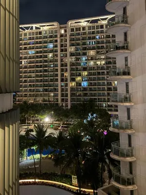 a view of a large building at night at Azure Urban Resort 1BR-2BR St Tropez in Manila