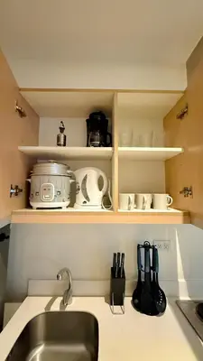 a kitchen with a sink and a counter top at Azure Urban Resort 1BR-2BR Boracay in Manila