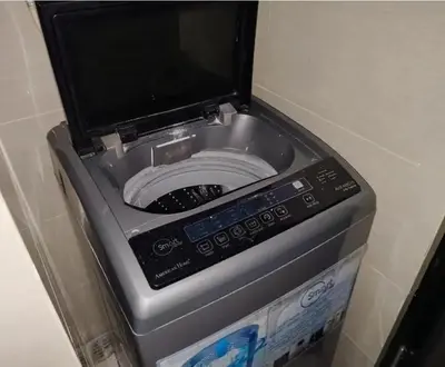 a fax machine with a monitor on top of it at Eighty One Newport Blvd Condo near NAIA3 in Manila