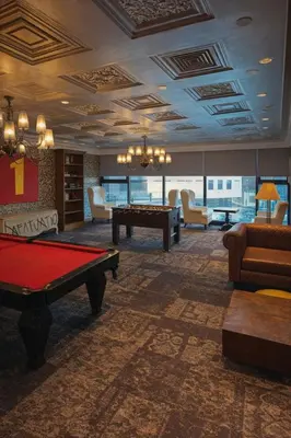 a billiard room with a pool table and couches at STAYLUXIA BOUTIQUE HOTEL KNIGHTSBRIDGE Pool Netflix Free Amenities in Manila