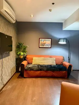a bedroom with a bed in a room at Makati City Poblacion 1 bedroom with balcony in Manila