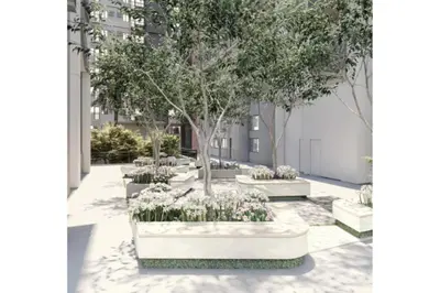 a courtyard with flowers and trees in a building at 2 BR Fully Furnished Condo in Parañaque with Pool and Parking - Bloom Unit 1134 in Manila