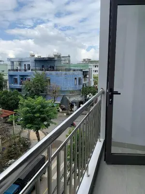 a balcony with a view of a city at Magallanes Escape in Manila