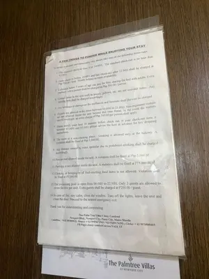 a piece of paper with writing on it at Theresa Place Like Home in Manila