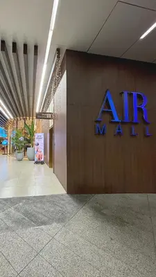 a large sign on a wall in a building at Air Residences Makati CBD 1BR w Balcony in Manila