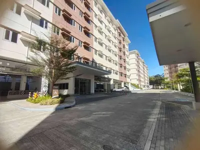 an empty street in front of a building at Beirut Bliss Suite at Hope Residences Trece Martires in Trece Martires