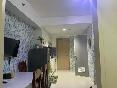 a kitchen with a hallway leading to a kitchen with a door at Budget Friendly Staycation -Ualat in Manila