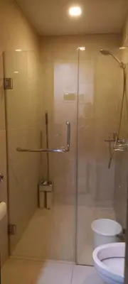 a bathroom with a shower and a toilet at Place to stay in Pasay in Manila