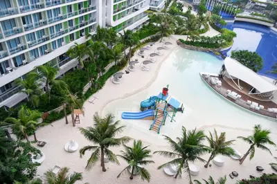 an aerial view of a water park at a resort at AZURE RESIDENCES near International AIRPORT MANILA in Manila
