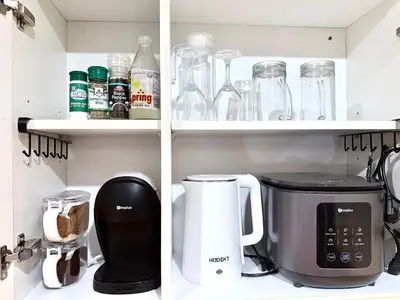 a kitchen with a coffee maker and a blender at Modern Condo in Makati with Stylish City Escape in Manila