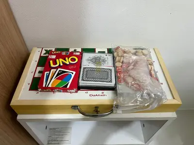a box sitting on top of a shelf with a box of candy at Near Vista Mall Taguig BGC with Overlooking Veranda Netflix and Pay Parking in Manila