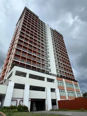 a large tall building with a lot of windows at Near Vista Mall Taguig BGC with Overlooking Veranda Netflix and Pay Parking in Manila