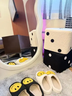 a pair of sandals and a pair of mirror at Azure Staycation by Adie Luxe Haven in Manila