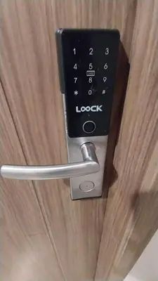a close up of a door with a door lock at MCStaycation at Spring Residence Near Airport in Manila