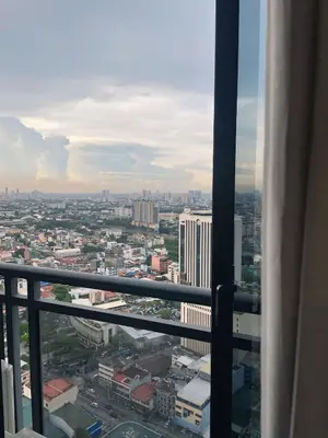 a view of a city from the top of a building at Designer Pad Town with Free Pool, Gym and Smart TV and Fast Wifi in Manila