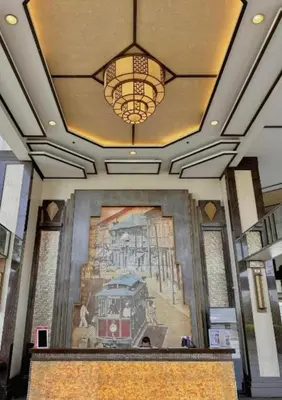 a ceiling with a painting of a train on it at The Sunset Suite at Torre 3916 in Manila