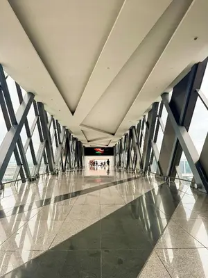 a hallway of a building with a large ceiling at Kai cabins NEAR NAIA 3 SELF CHECK IN AT NEWPORT CITY in Manila
