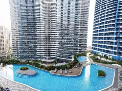 an aerial view of a city with tall buildings at Makati Staycation by Jing in Manila