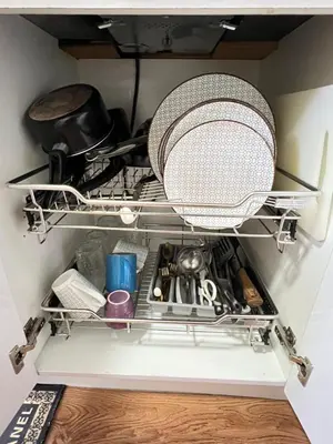 a drawer in a refrigerator filled with utensils at Shore 2 Near MOA Arena IKEA Okada in Manila