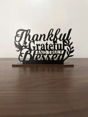 a metal sign that reads thankful grateful and happy at Lovekin's Nest at The Verdin in General Trias