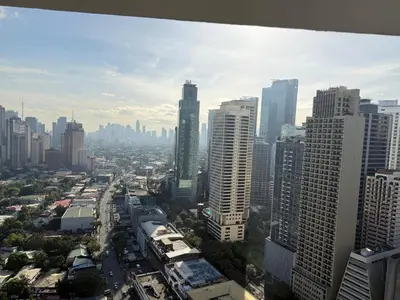 a city view of a city with tall buildings at Jazz Staycation Makati By As in Manila