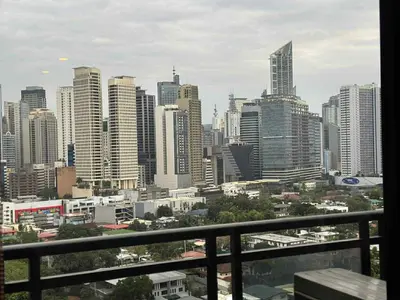 a view of a city skyline with tall buildings at The Gramercy Residences in Manila