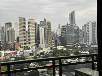 a view of a city skyline with tall buildings at The Gramercy Residences in Manila