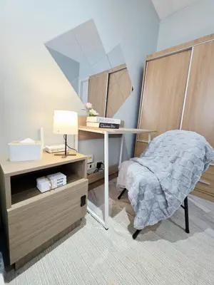 a bedroom with a table with a bed and a mirror at Stay in Makati 1-BR Condo with Pool, Fast WiFi, Gym, Balcony in Manila