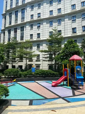 a playground with a slide in front of a building at Cluster 3, 81 Newport Blvd near NAIA T3 in Manila