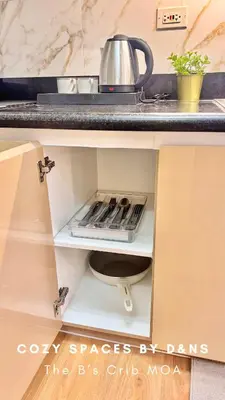 a kitchen drawer with utensils in it at SM MOA Near NAIA Airports The B's Crib MOA in Manila
