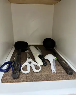 a group of tools sitting on the floor in a corner at The Lumora Cove at Shore 2 Residences in Manila