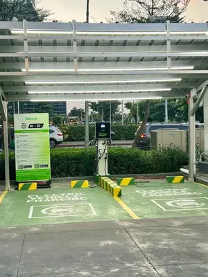 a parking lot with a parking meter and a canopy at Pit Stop Haven Near Manila Airport and Mall of Asia in Manila