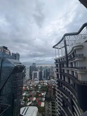 a view of a city from a building at 61F City View at Knightsbridge Makati in Manila