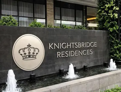 a sign in front of a building at 61F City View at Knightsbridge Makati in Manila