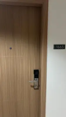 a close up of a door with a sign on it at Condotel 1BR w balcony at MOA SMDC Shore3 T1 in Manila