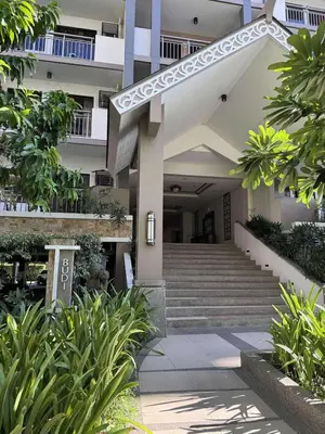 a building with stairs and plants in front of it at Alea Residences 1 Bedroom Condo with Pool View Balcony in Manila