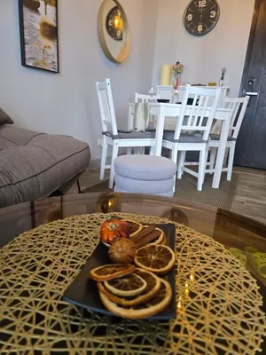 a tray of food on a table in a living room at Gentry Manor Okada Westside City Paranaque by Royale Prestige Le Maison in Manila