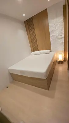 a bedroom with a bed in a room at 924 Villa Tropez Tower in Manila
