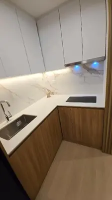 a kitchen with a sink and a counter top at 924 Villa Tropez Tower in Manila