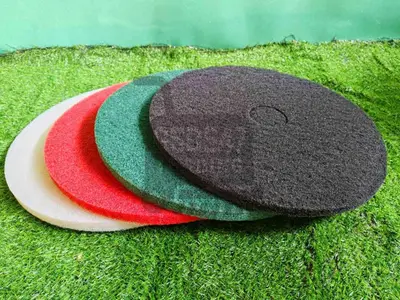 a felt hat on top of the grass at Jaustine's Cabin in Manila