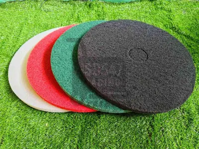 two colored stones sitting on top of green grass at Jaustine's Cabin in Manila