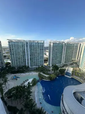 a view of a resort with tall buildings at Azure staycation in Manila