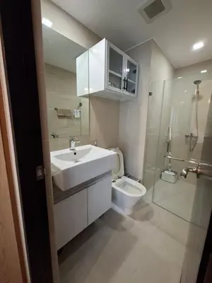 a bathroom with a sink and a toilet at THE Faithful Nest in General Trias