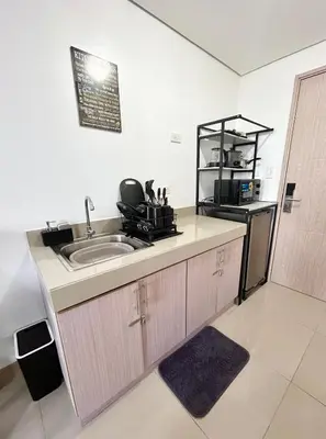 a kitchen with a sink and a counter at SELF CHECK-IN Near La Salle Dasma in Dasmariñas