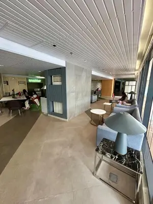 a living room with a couch and a table at SELF CHECK-IN Near La Salle Dasma in Dasmariñas