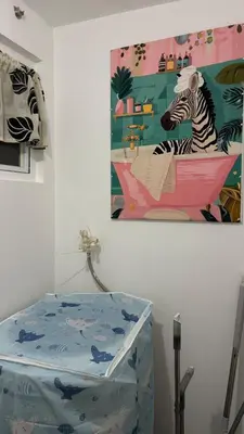 a painting of a zebra in a bath tub at Rosé Nights Luxury in Manila