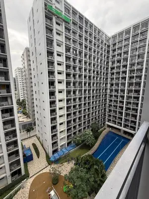 an aerial view of a large apartment building at Staycation Marcos Residence in Manila