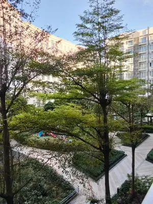 a view of a park with trees and buildings at Cluster4 4A in Manila