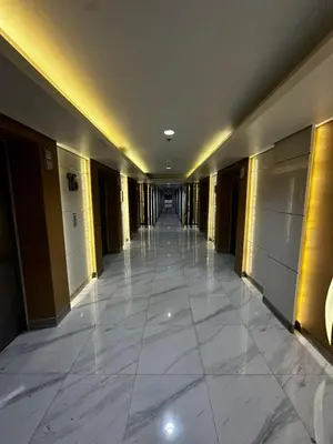 an empty hallway of a building with ailed floor at Near Airport Malls shore 3 Mall of Asia in Manila