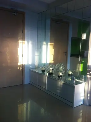 a room with a counter with silver items on it at Sea Residences - Rheiyn in Manila